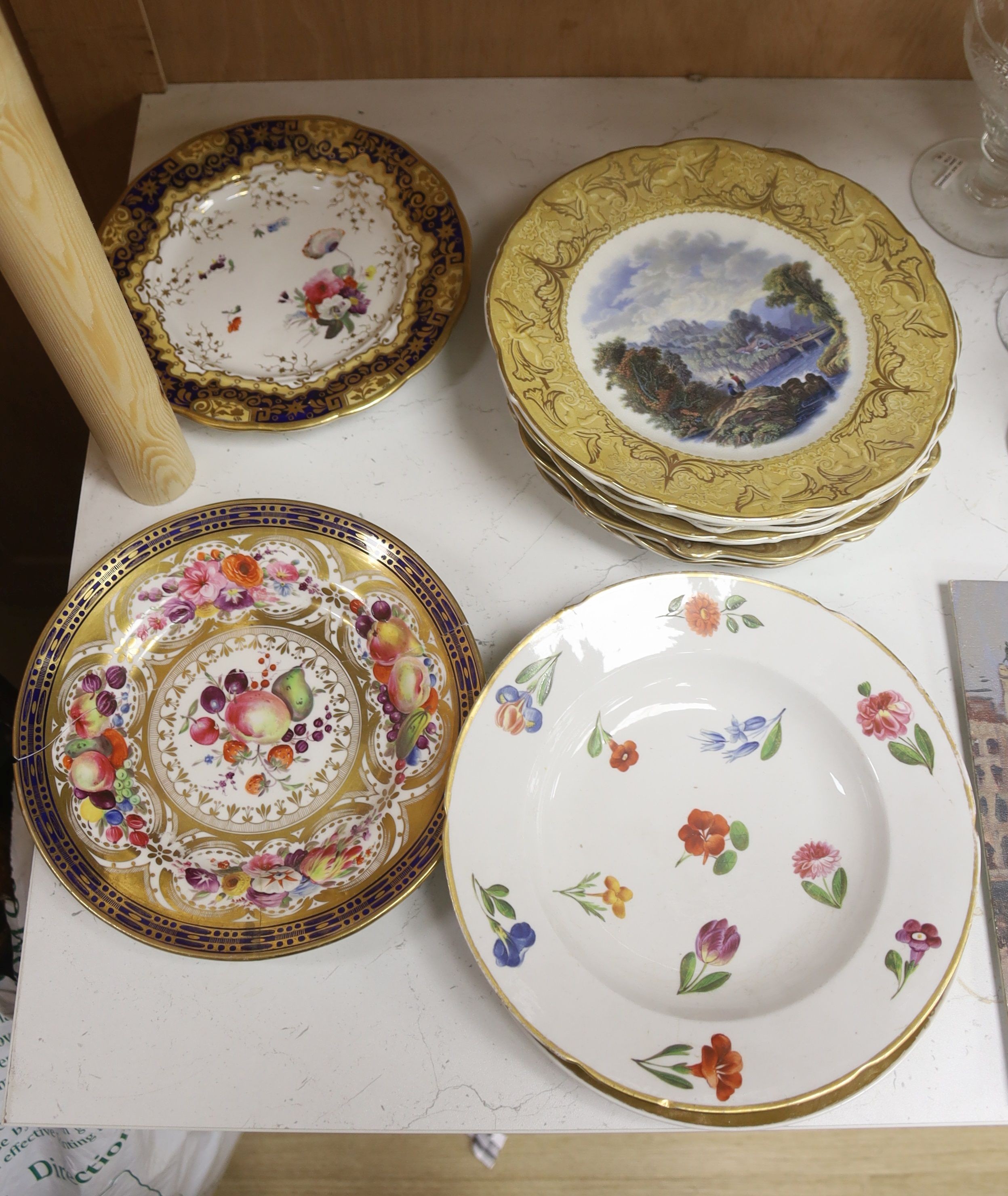 A collection of eight F & R Pratt landscape plates and six 19th-century porcelain plates